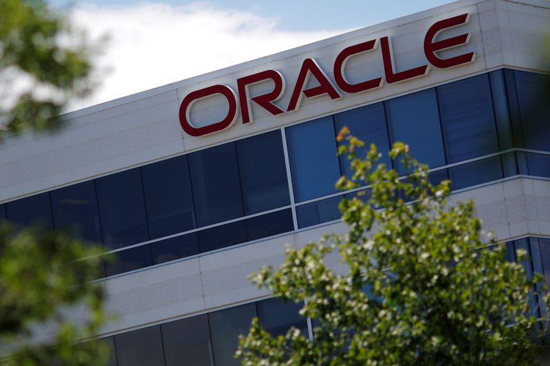 A sign marks a building housing Oracle offices in Burlington