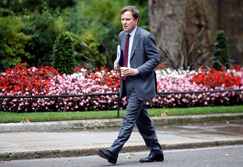 Conservative MP Greg Hands walks outside Downing Street in London