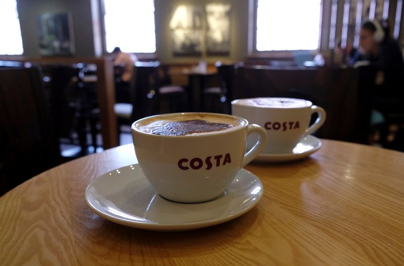 FILE PHOTO: Cappuccinos sit on a table in Costa Coffee