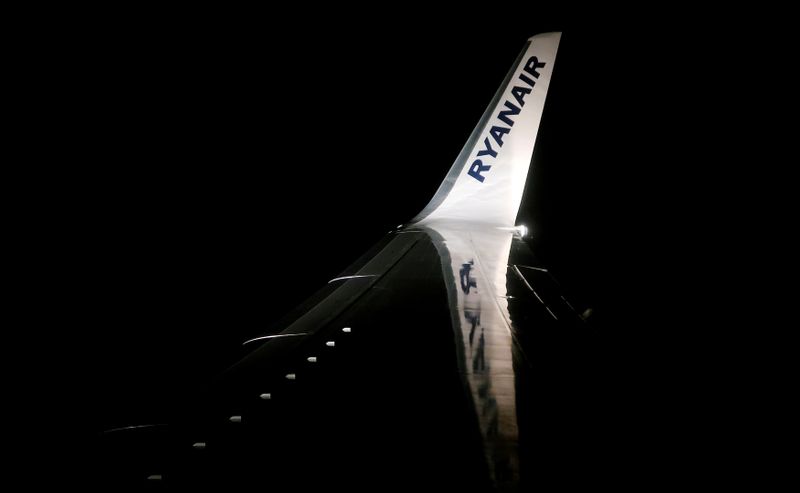 A Ryanair logo is seen on a wing of a
