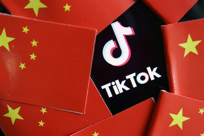 FILE PHOTO: Illustration picture of Tiktok with Chinese flags