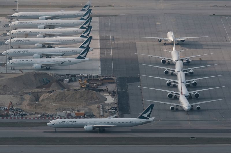 FILE PHOTO: FILE PHOTO-Cathay Pacific aircraft are seen parked on
