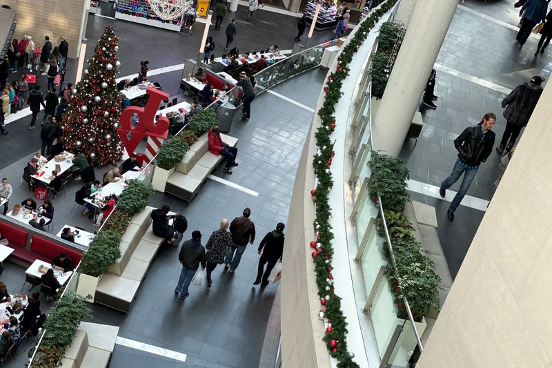 Shoppers make their way through Fashion Centre at Pentagon City,