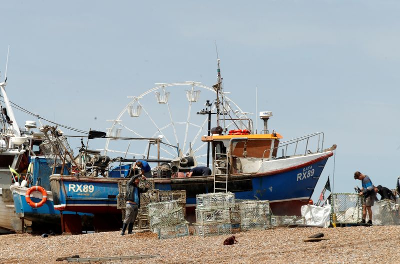 Fishing boats and fisherman in Hastings