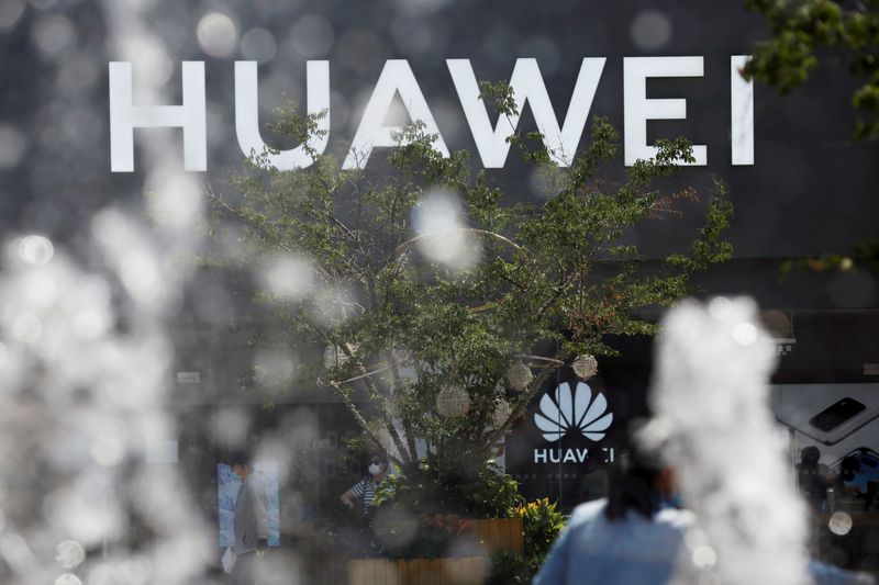FILE PHOTO: Huawei sign is seen on its store at