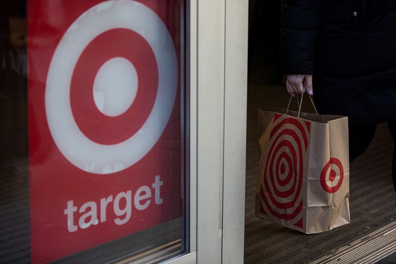 A shopper carries a Target paper bag in the Manhattan