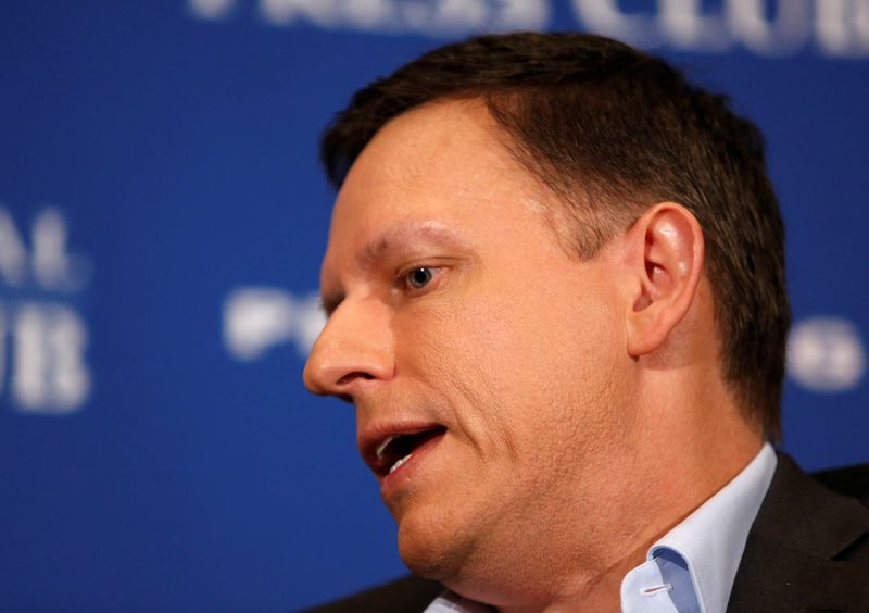 FILE PHOTO: PayPal co-founder and Facebook board member Thiel delivers