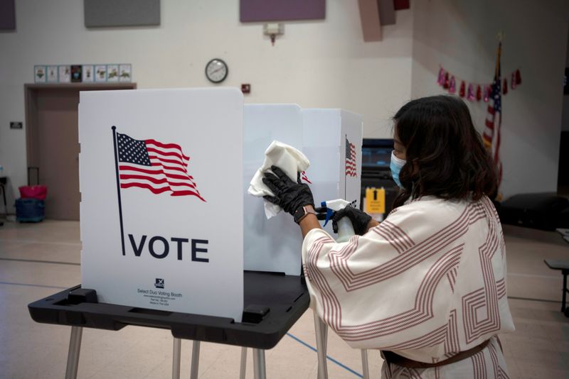 FILE PHOTO: Voters cast their ballot in New Mexico primary
