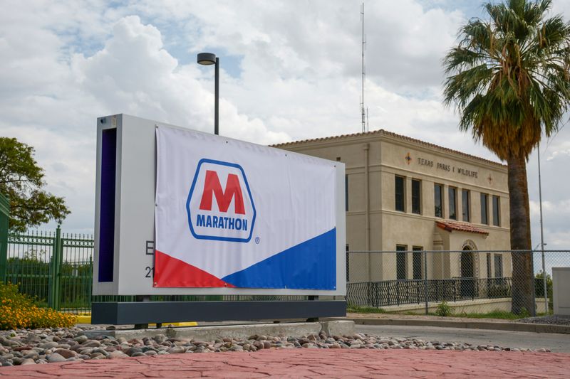 A Marathon Petroleum banner covers an Andeavor sign outside the