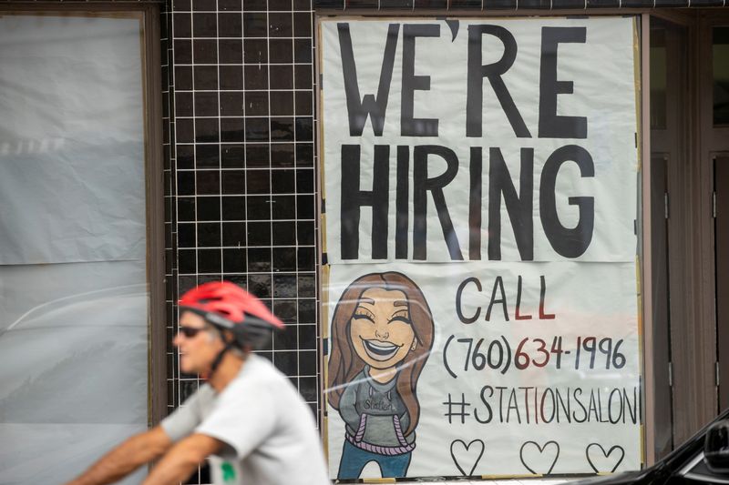 FILE PHOTO: A new business advertises for workers as it