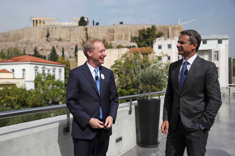 President of Microsoft Brad Smith speaks with Greek Prime Minister
