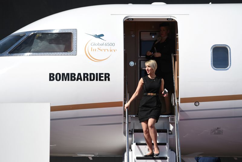 FILE PHOTO: An attendee exits the Bombardier Global 6500 business