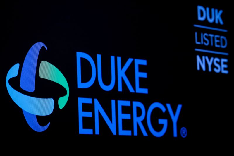 FILE PHOTO: The company logo and ticker for Duke Energy