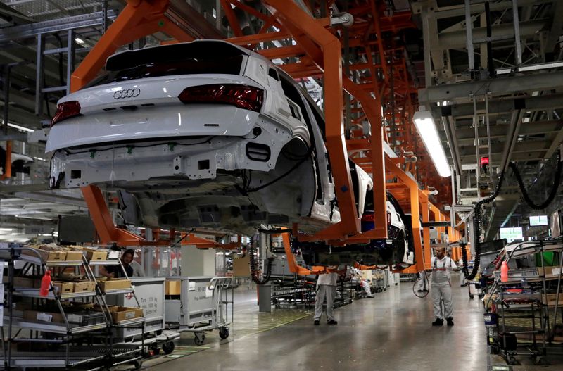 FILE PHOTO: Employees work at an Audi Q5 2.0 production