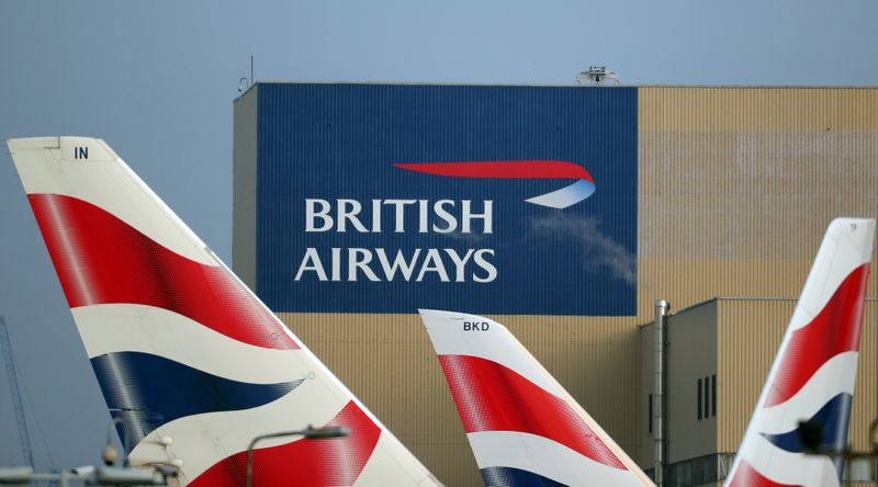 FILE PHOTO:  British Airways logos are seen on tail