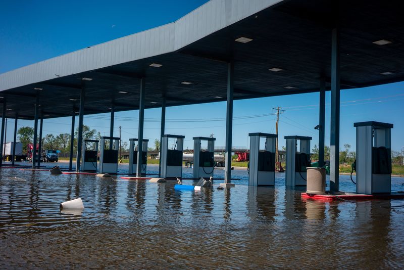FILE PHOTO: A gas station remains flooded from Hurricane Delta