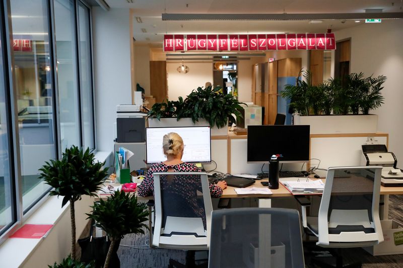 An employee works at the Magyar Telekom HQ during the