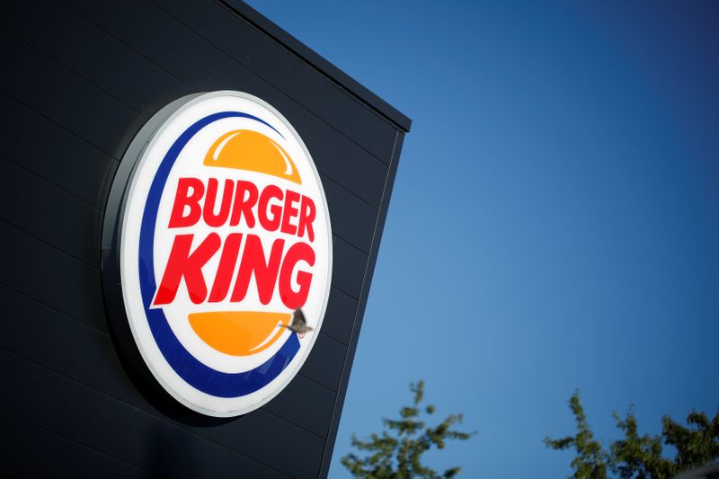 The Burger King company logo stands on a sign outside