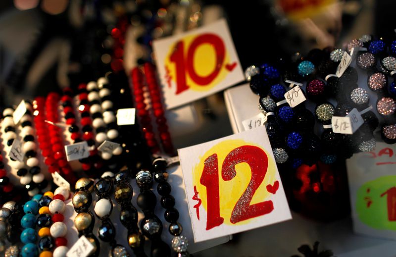 Prices are seen on bracelets in a shop in New