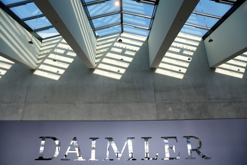 The Daimler logo is seen before the Daimler annual shareholder