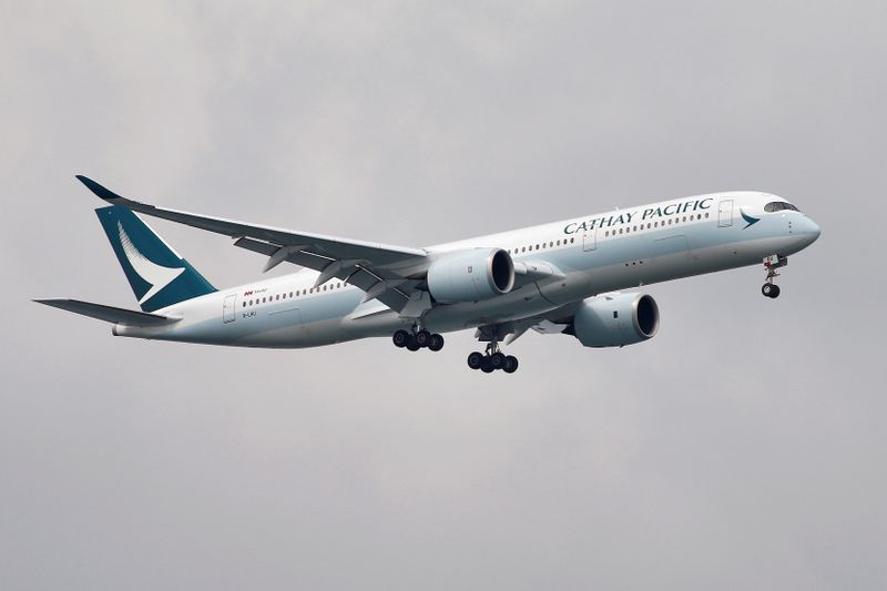 A Cathay Pacific Airways Airbus A350 airplane approaches to land