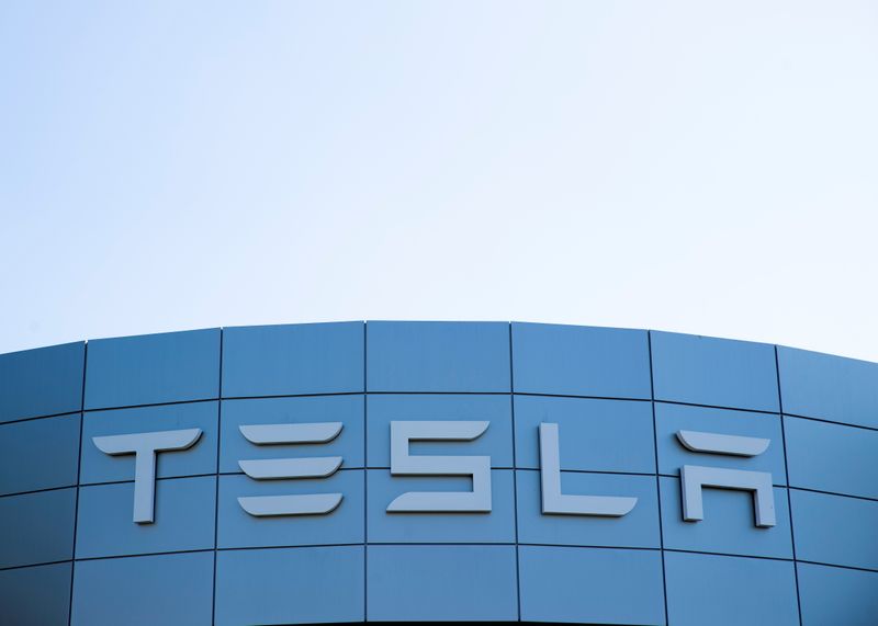 A Tesla service center is shown in Costa Mesa, California