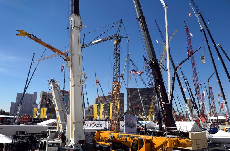 Cranes and other construction equipment are seen towering over Las
