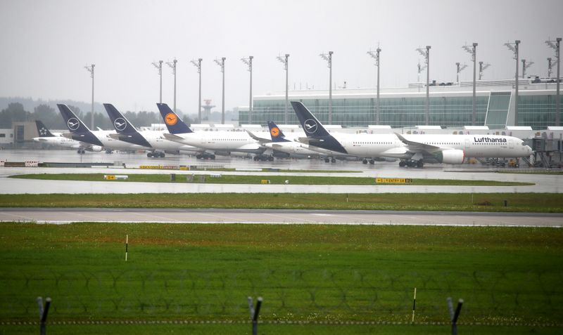 FILE PHOTO: Airplanes of German carrier Lufthansa stand on the