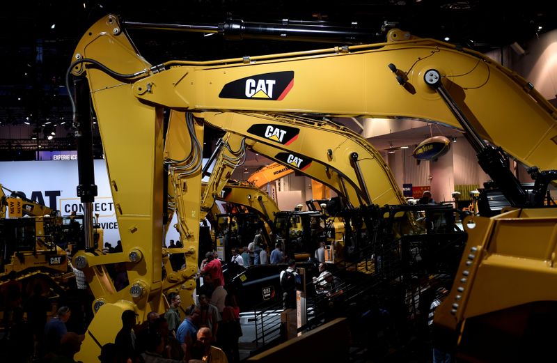 FILE PHOTO: A row of excavators are seen at the