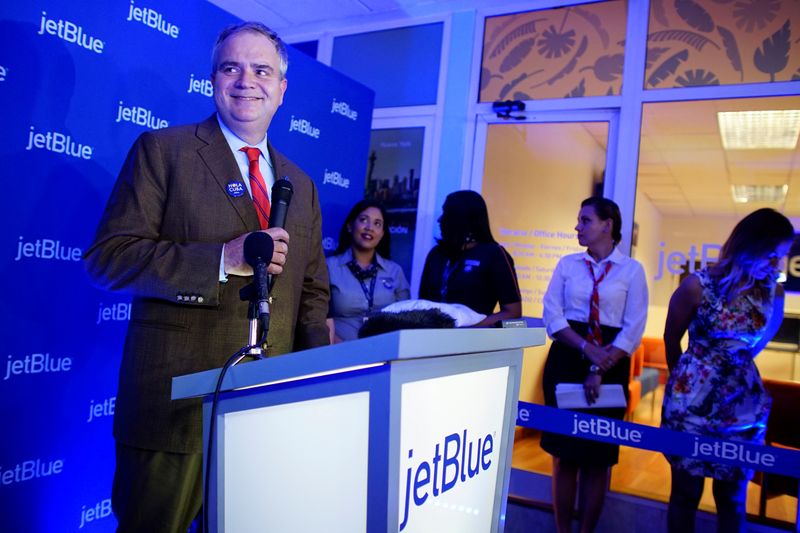 JetBlue’s chief executive Robin Hayes speaks during the opening of