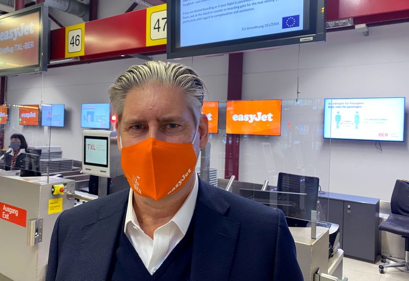 EasyJet CEO Johan Lundgren poses at check in at Berlin