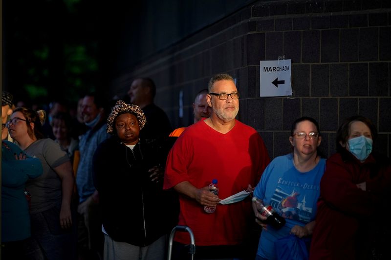FILE PHOTO: People line up outside Kentucky Career Center in
