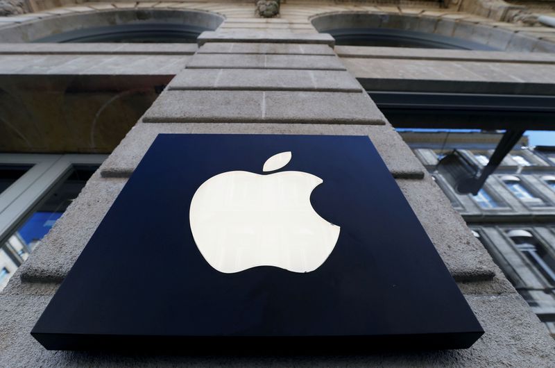 FILE PHOTO: The logo of Apple company is seen outside