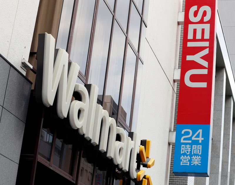 Logos of Walmart and Seiyu are pictured at the headquarters