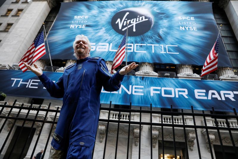 FILE PHOTO: Sir Richard Branson stands outside the New York