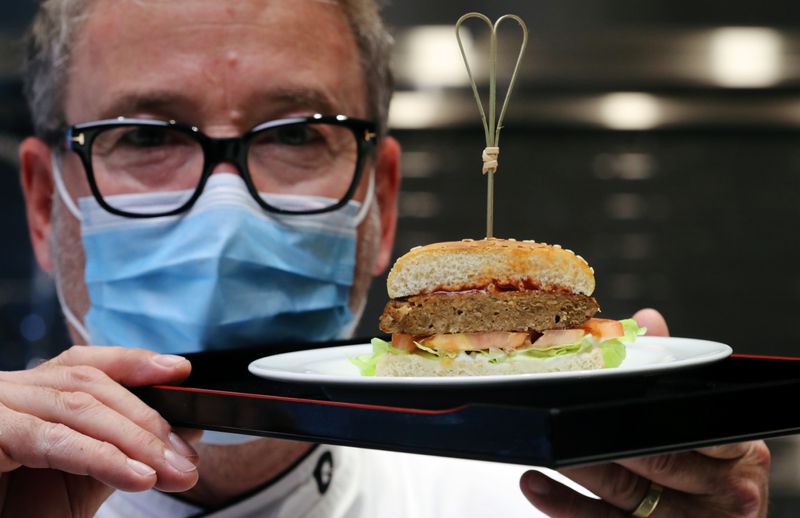 Chef Brunschweiler displays a pea protein-based hamburger at flavour maker