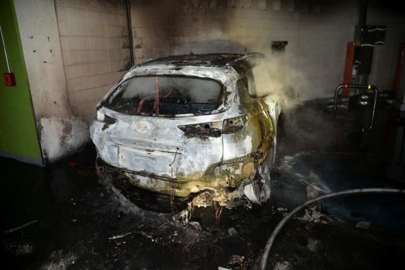 The burnt wreckage of a Hyundai Kona Electric vehicle is