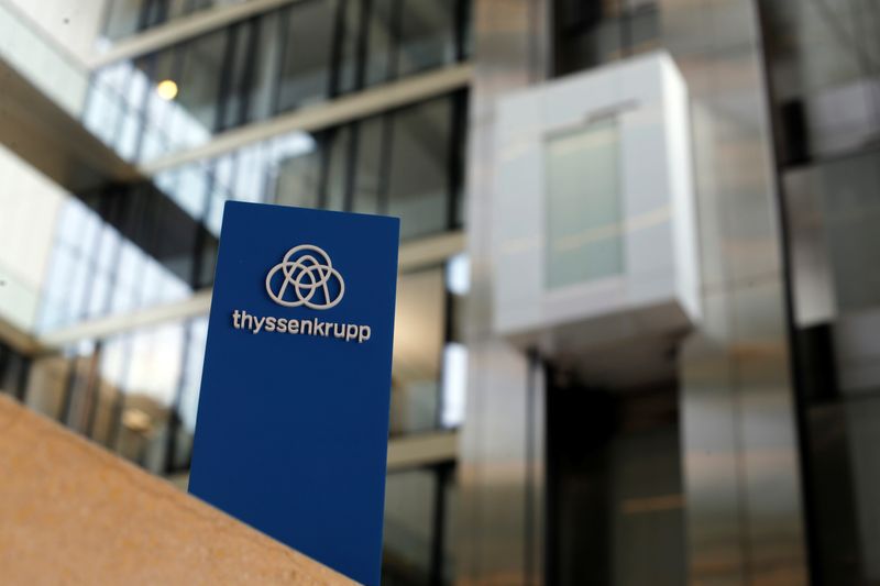 The logo of Thyssenkrupp is seen near elevators in its