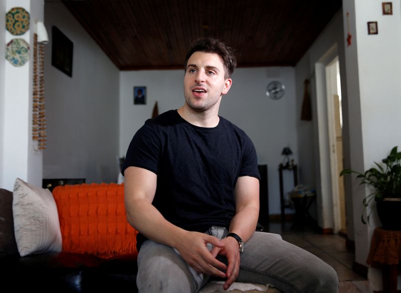 FILE PHOTO: Co-founder and CEO of Airbnb Brian Chesky speaks