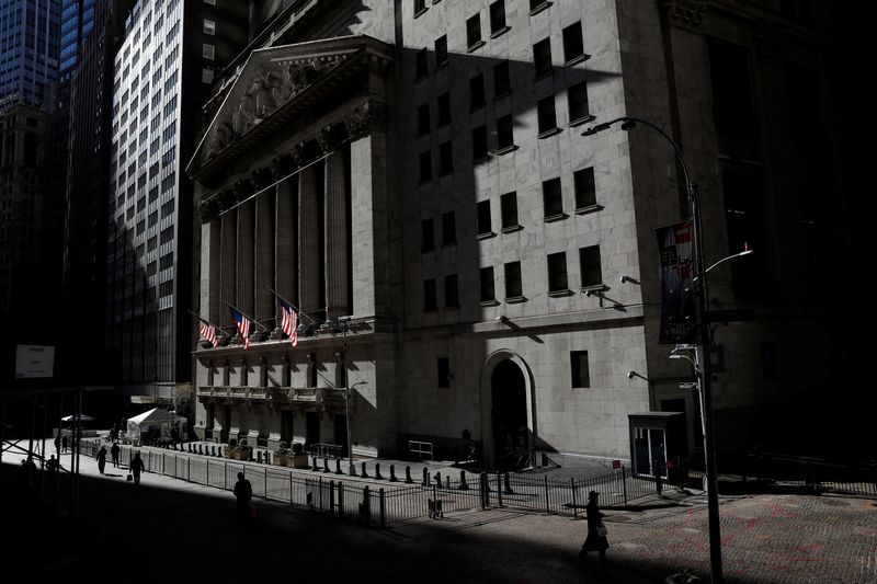 The New York Stock Exchange (NYSE) is seen as people
