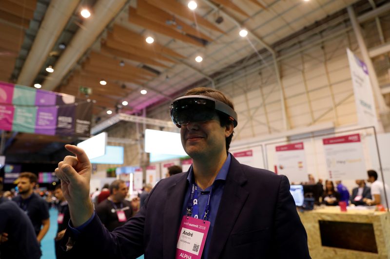 FILE PHOTO: A visitor wears virtual reality glasses during the