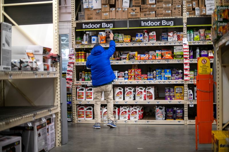 A shopper reaches for merchandise at a Home Depot store