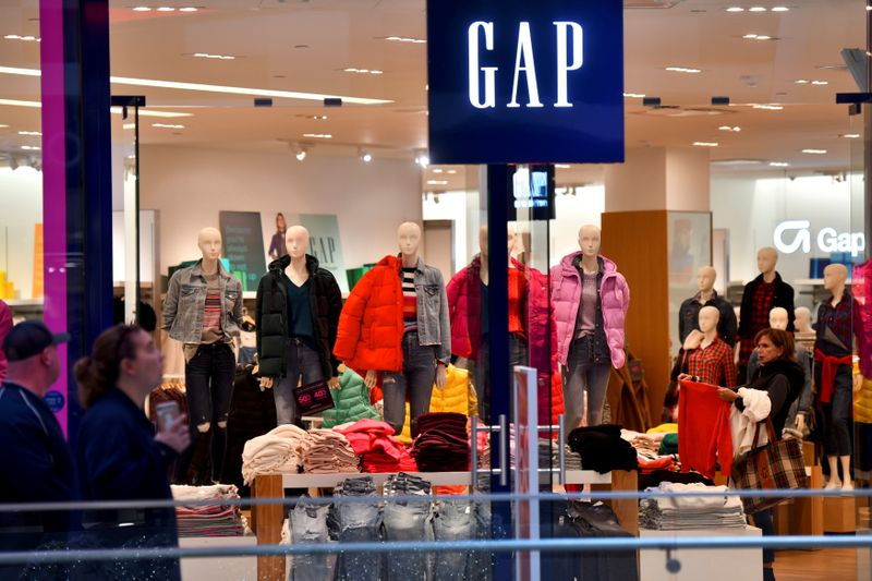 FILE PHOTO: A woman shops at a Gap store as