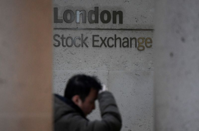 People walk past the London Stock Exchange Group offices in