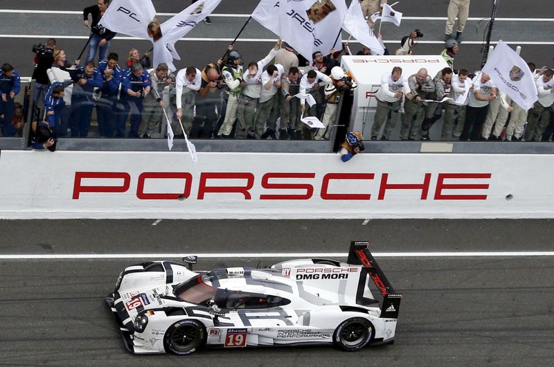 FILE PHOTO: Nico Hulkenberg of Germany celebrates with mechanics after