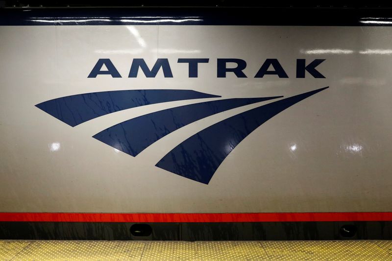 An Amtrak train is parked at the platform inside New