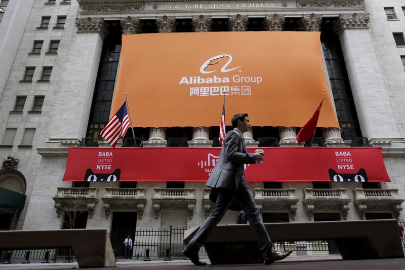 FILE PHOTO: Signage for Alibaba Group Holding Ltd. covers the
