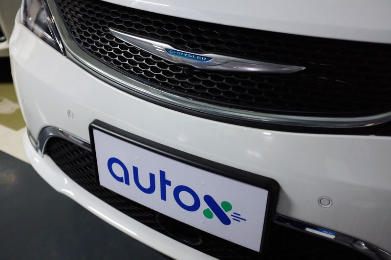 Sign of Alibaba-backed autonomous driving startup AutoX is seen on
