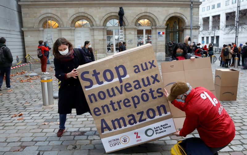 French activists demonstrate against Amazon in Paris