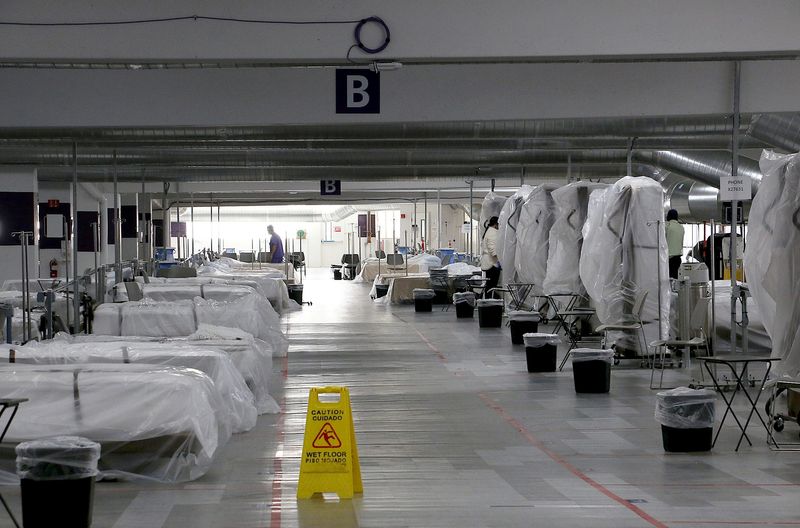 FILE PHOTO: Back-up hospital beds are seen in the parking